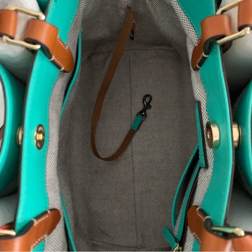 Dooney & Bourke southwest Turquoise Barlow purse
Like New !!!!!! SALE!!!!!!! - Picture 7 of 11